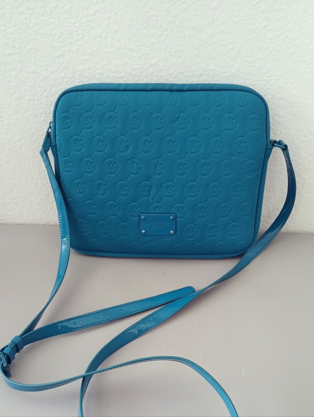 Michael Kors Teal Embossed Logo Crossbody With Foam Used Tablet Protector